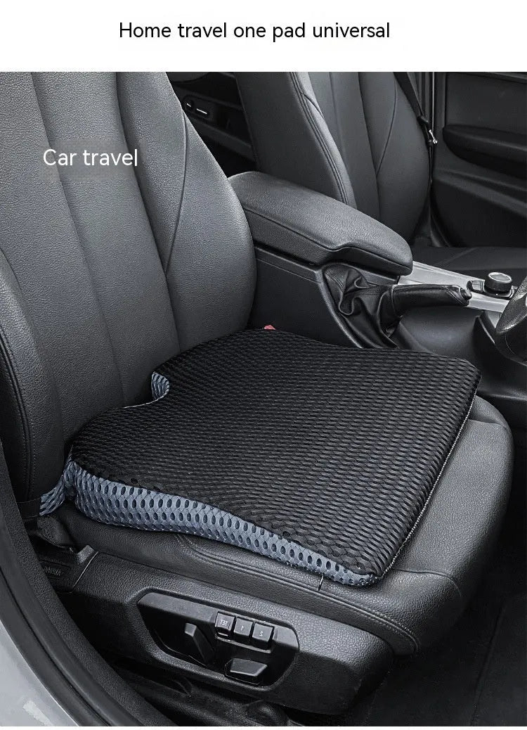 Regular size memory foam seat cushion with a black strap, shown in a creamy white solid colour.