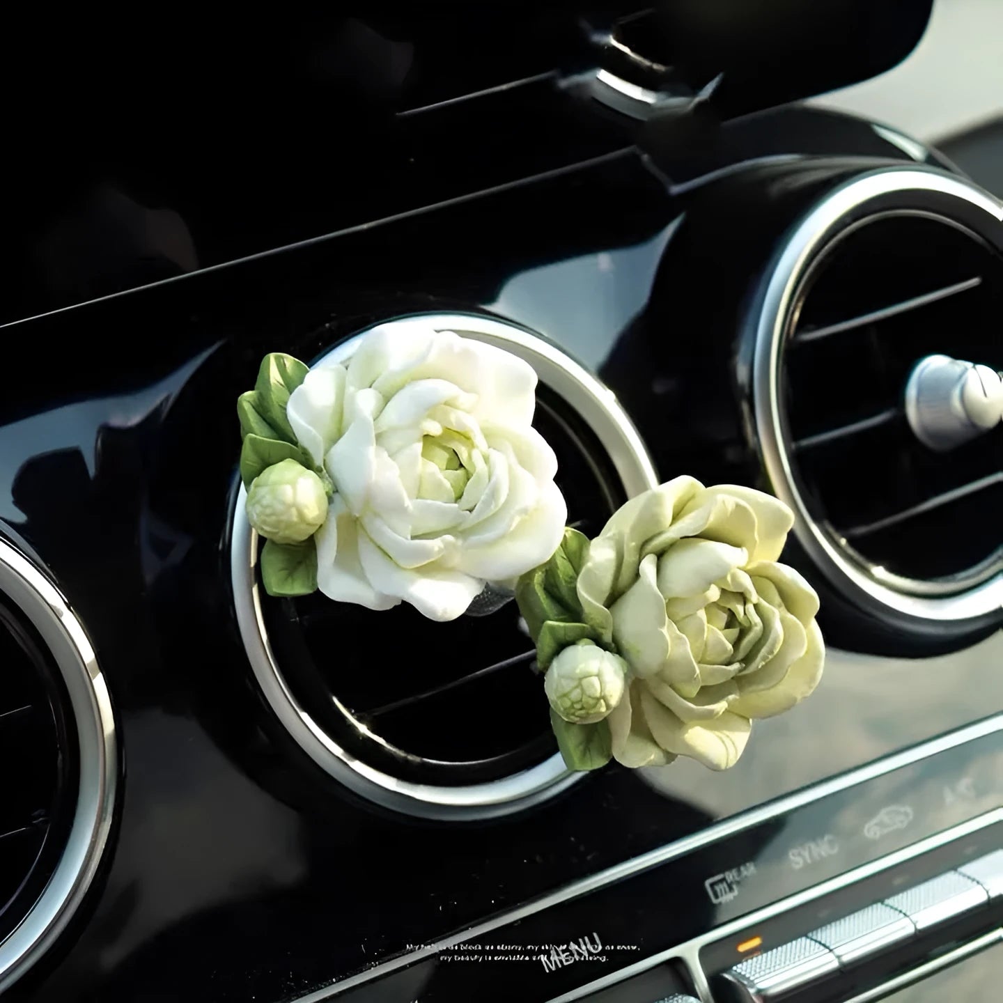 Jasmine scented solid gypsum car air vent diffuser in off white or green.