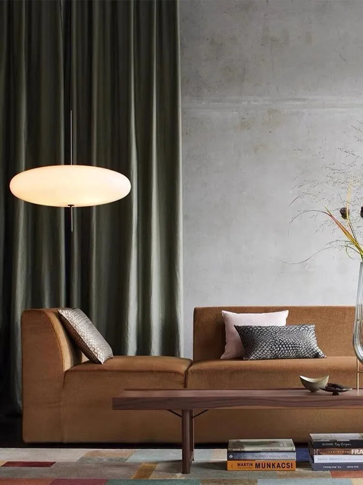 Nordic retro UFO-shaped designer chandelier ceiling light in all white or black and white finish.