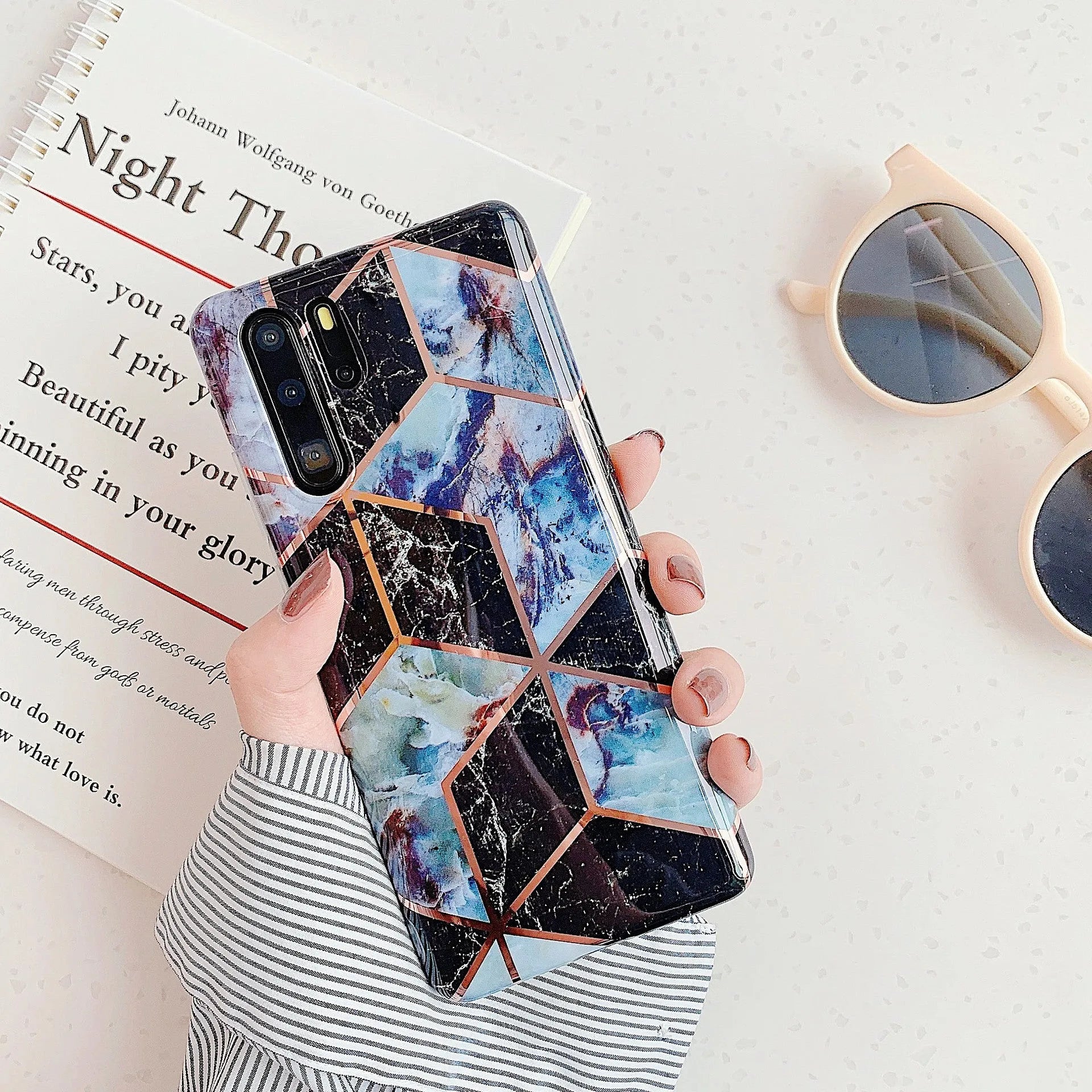 Electroplated marble pattern mobile phone case showing multiple colour options for Huawei and Samsung smartphones