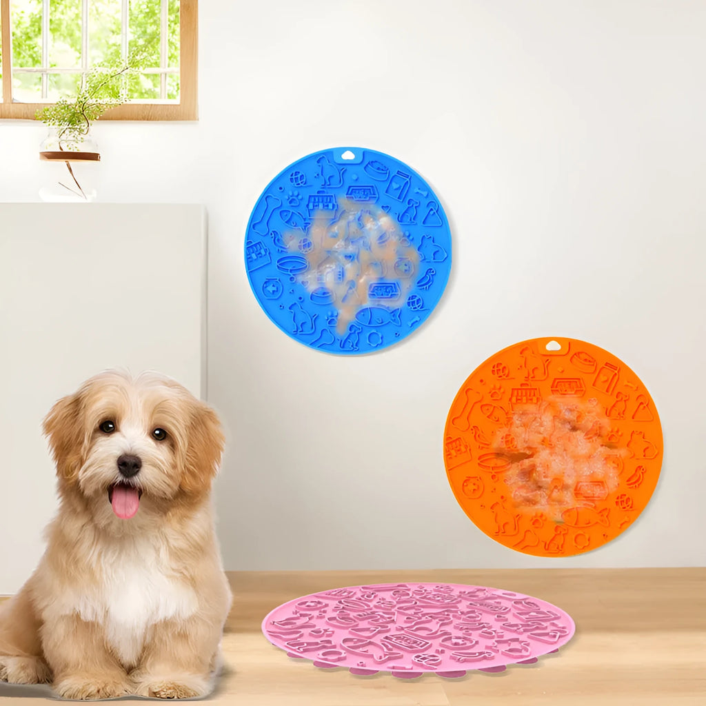 Round blue silicone pet lick mat with suction cup base on a kitchen counter