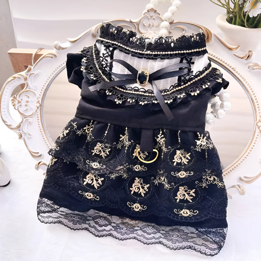 Golden Gothic princess skirt costume for a small dog on a mannequin.