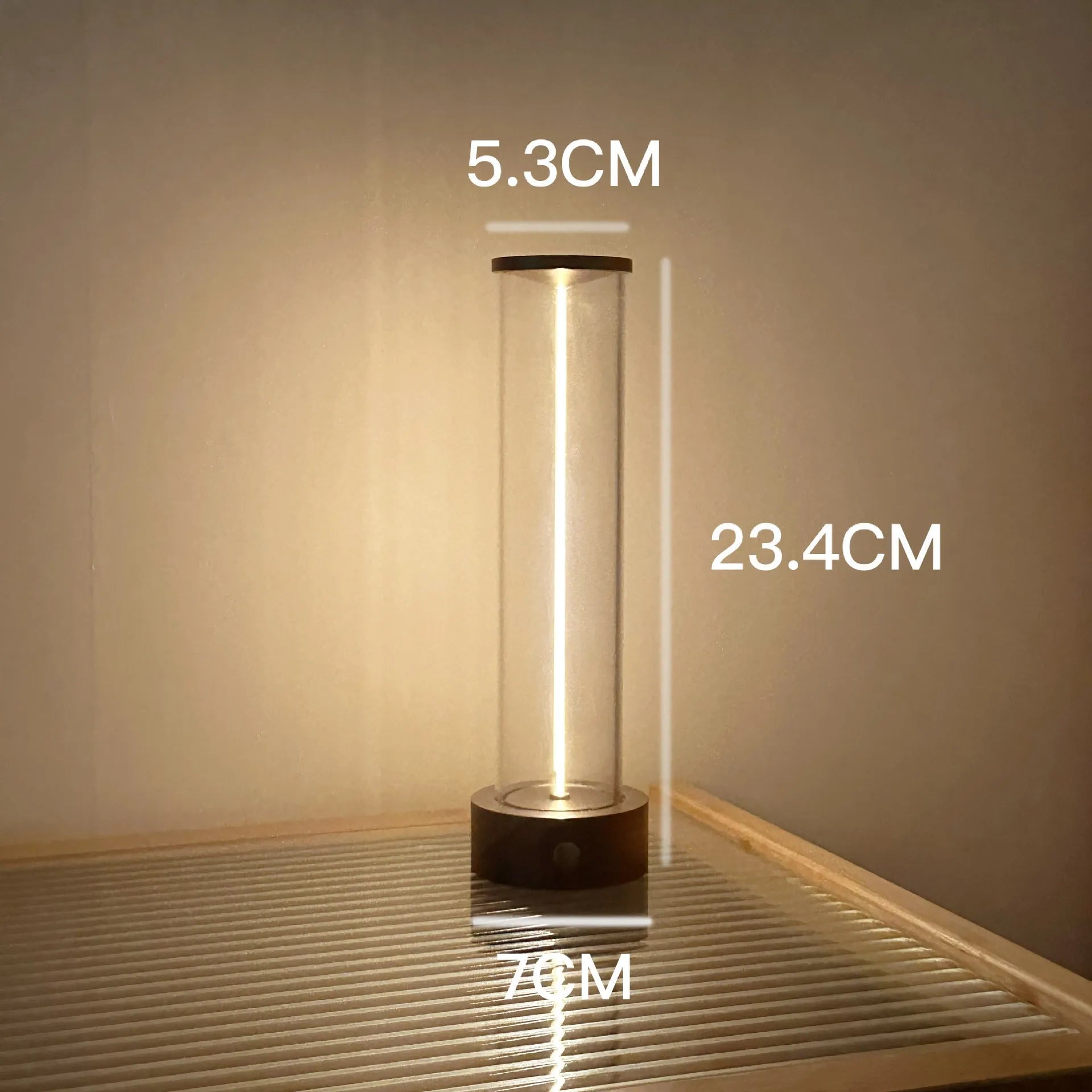 Grey modern LED line glass light strip with magnetic suction base for USB charging.