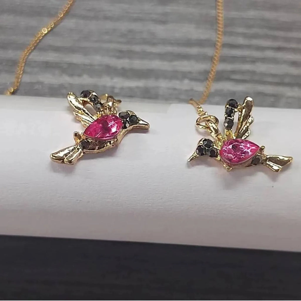 Bird hanging earrings with zirconium wings in long drop style