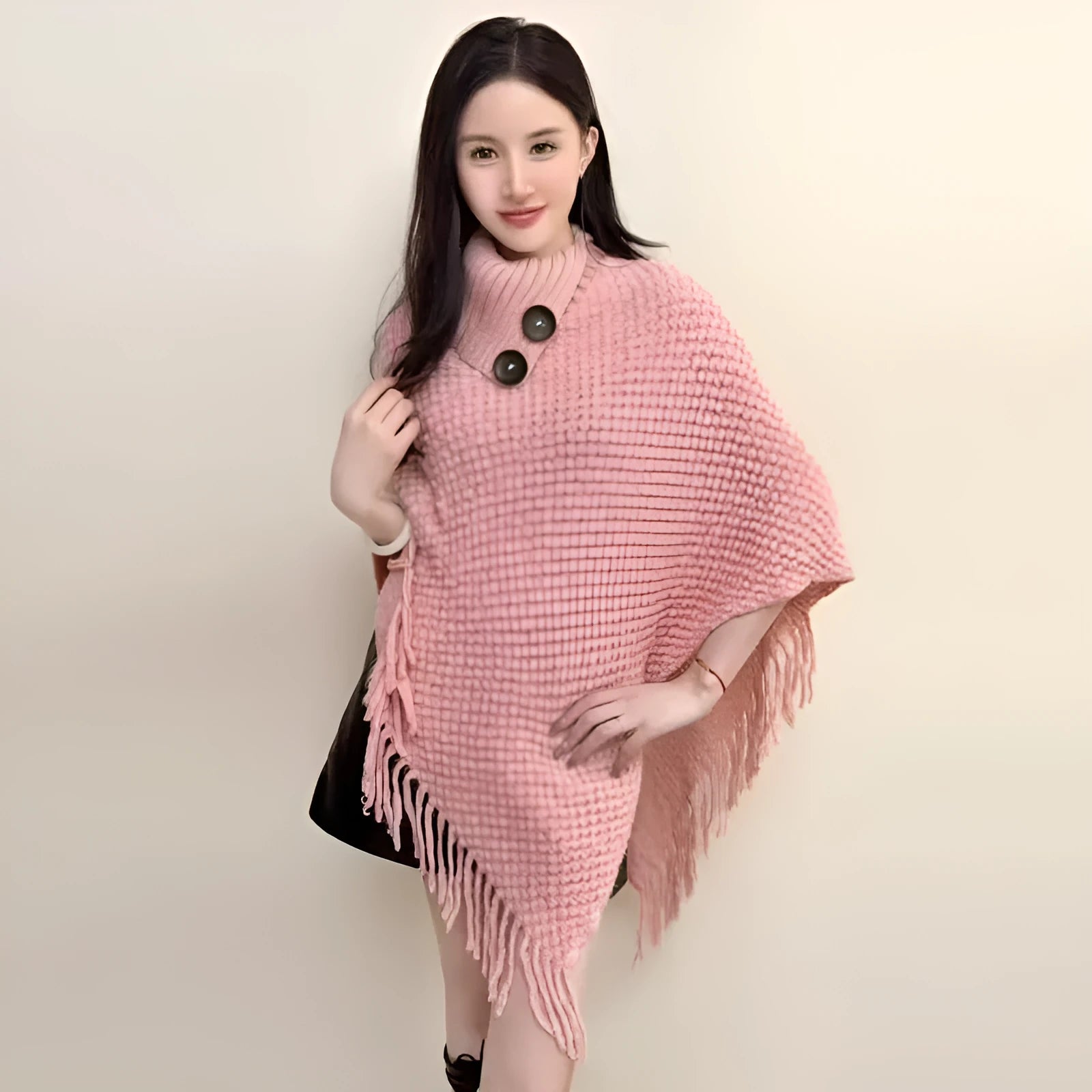 Women's plush cashmere blend triangle shawl cape with tassel trim in multiple colour options.