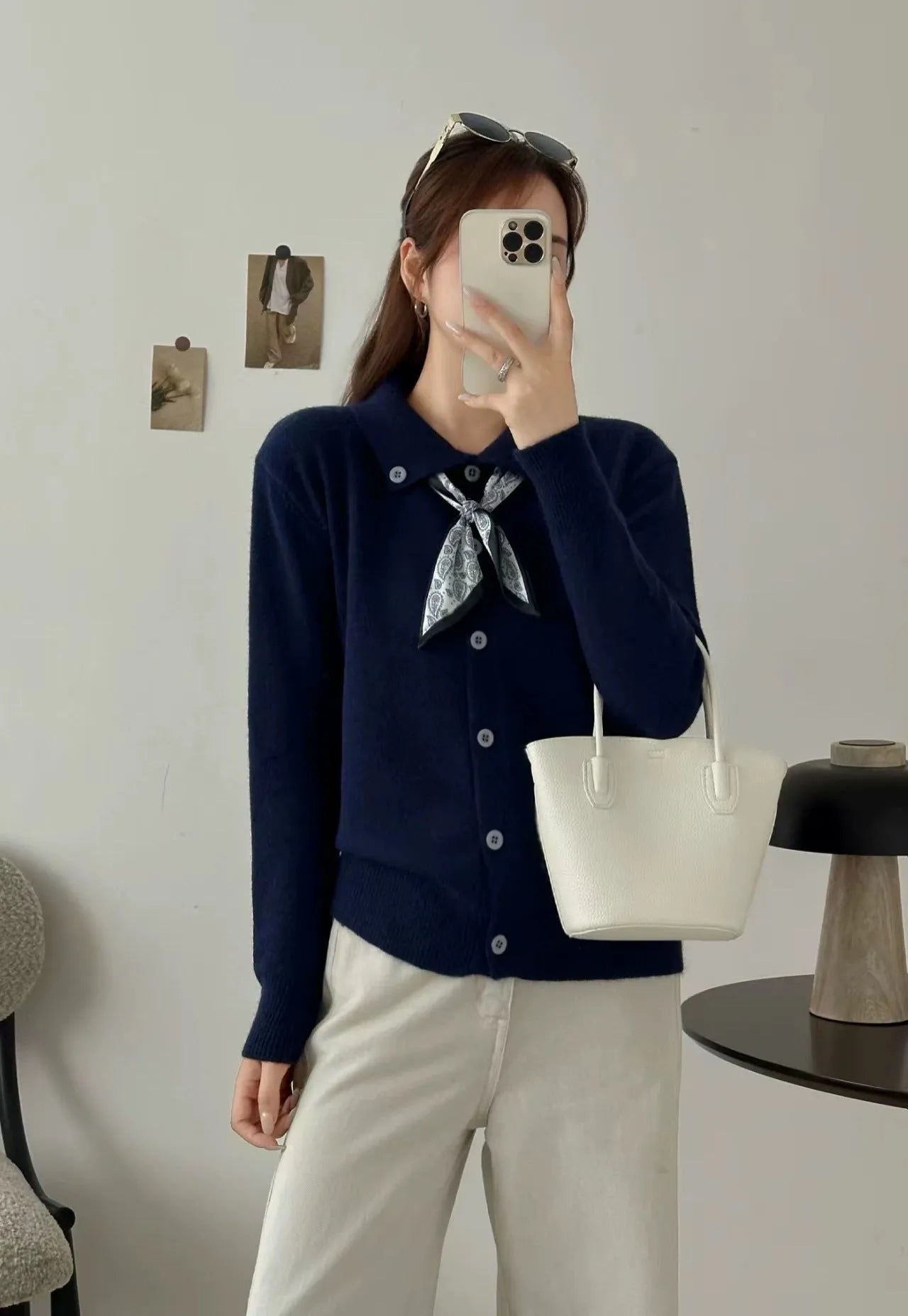 Beige lapel scarf collar acrylic cardigan with long sleeves on a hanger