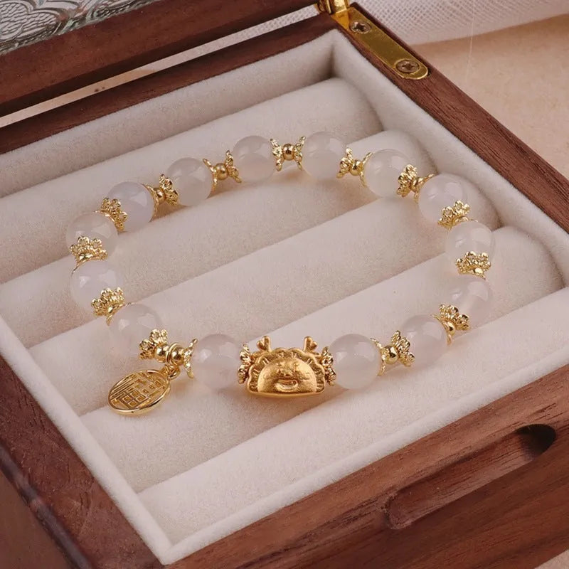 Women's floral glazed bracelet with zodiac animal charms and coloured glass beads