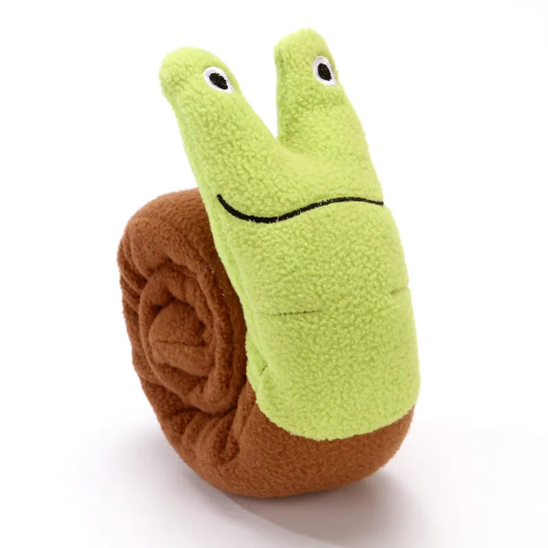 Squeaky dog puzzle snuffle toy that transforms into snail or stick shape for foraging games.