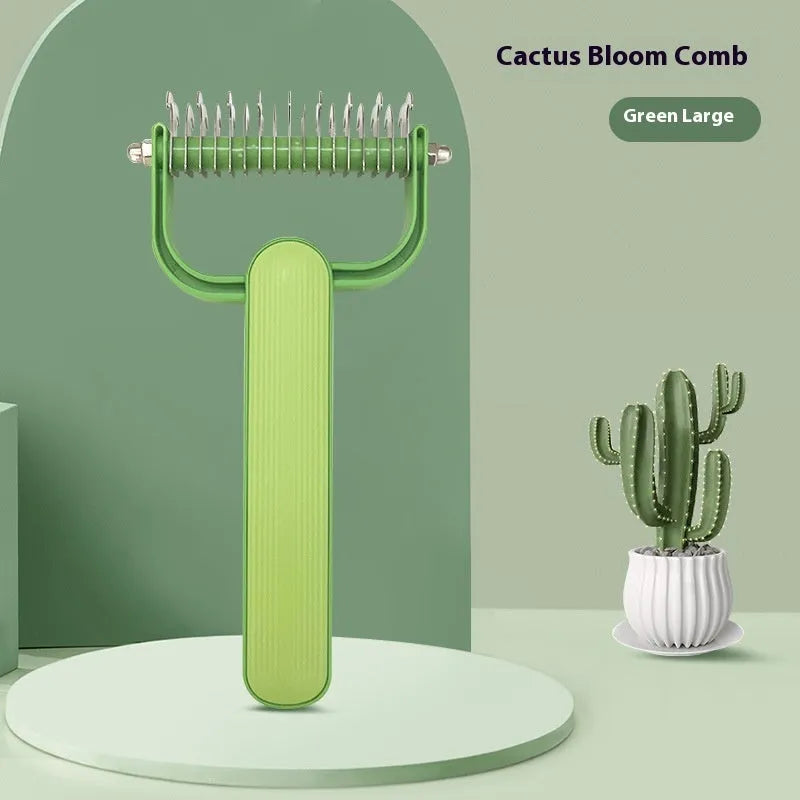 Green and grey dog hair unknotting comb with stainless steel teeth on a plastic handle.
