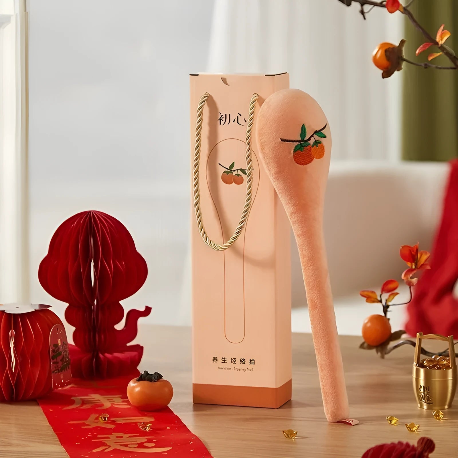 48 cm persimmon coloured back percussion massage stick with zipper detail