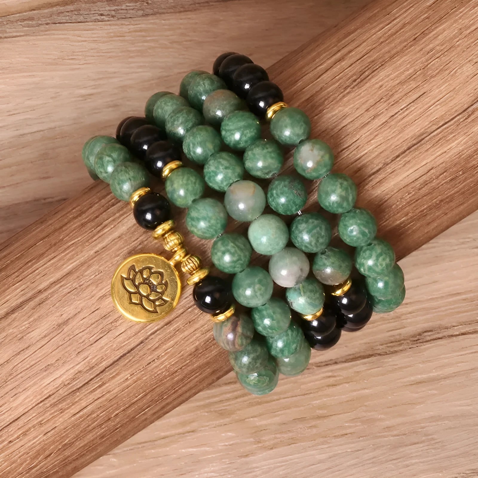 Green and black elastic beaded long bracelet with alloy components
