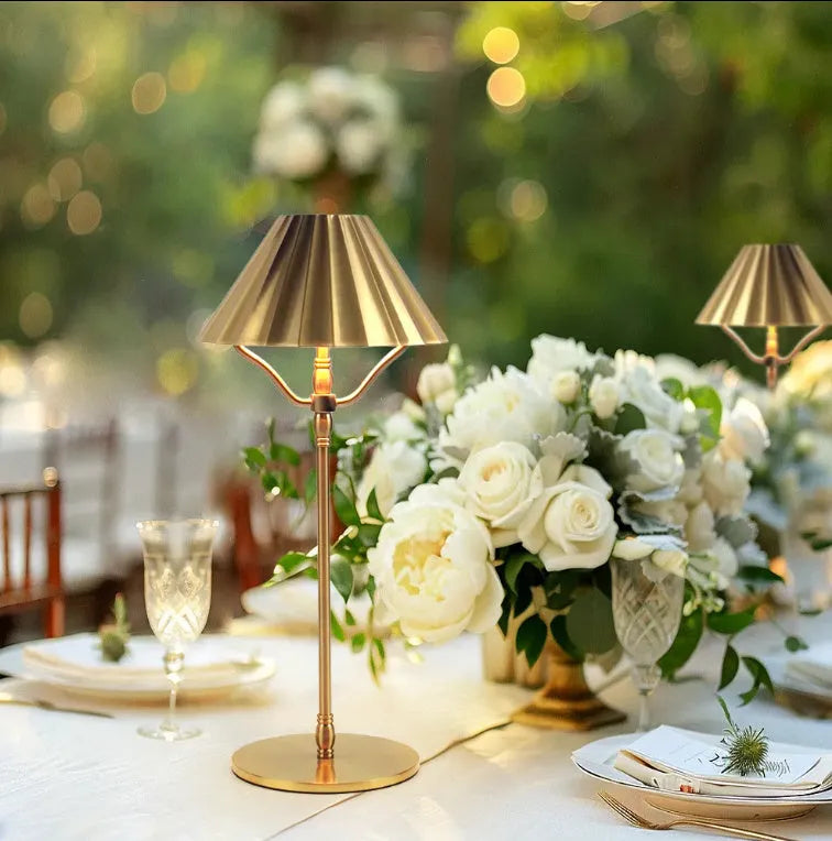 Gold-coloured alloy desk lamp with a fabric lampshade, showing a USB Type-C charging port.