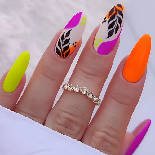 Four boxes of almond-shaped frosted nail stickers showing French leaves, leopard print, macaron and plating designs with tulip pattern