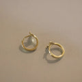 925 sterling silver fishtail earrings with golden plating, approximately 8mm diameter
