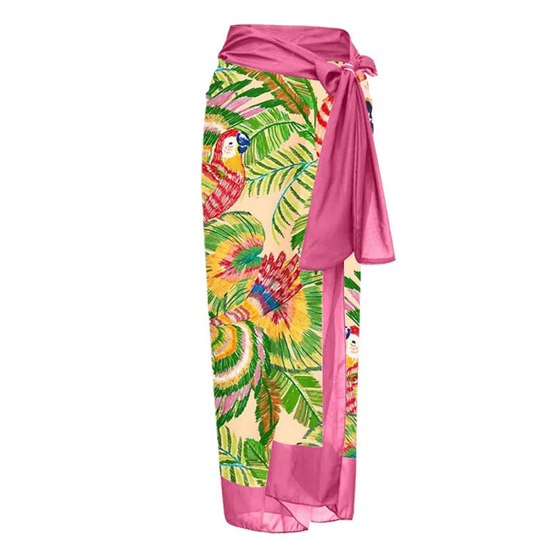 Women's pink floral print one-piece swimsuit with V-neck, covered belly, and attached skirt for swimming