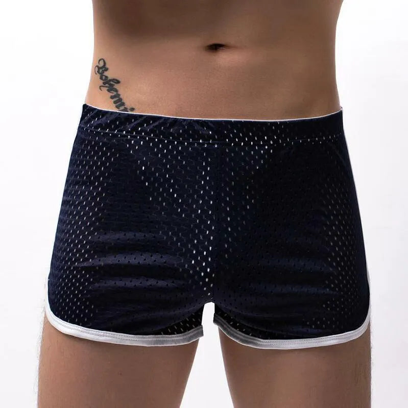 Men's black three-point boxer shorts made from a knitted cotton and nylon fabric.