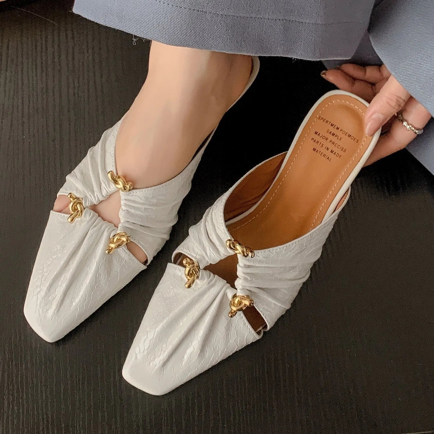Women's genuine leather half toe cap slippers in silver with square toe and low TPR sole.