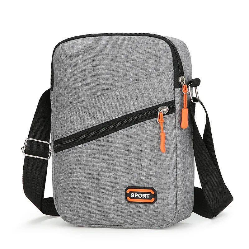 Ultra-light Oxford cloth crossbody commuter bag in silver grey with contrast colour detail.