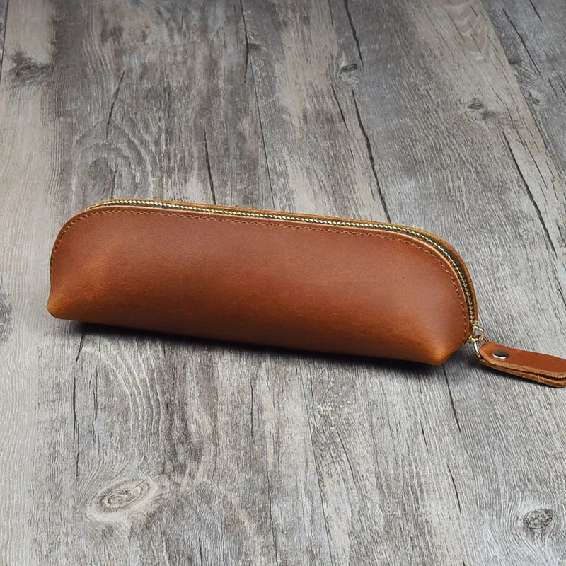 Handmade square leather pencil and glasses case with zipper, shown in black colour.