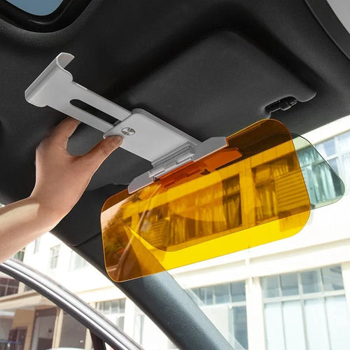 Dual-function anti-glare car sun visor with telescopic arm and acrylic lens.