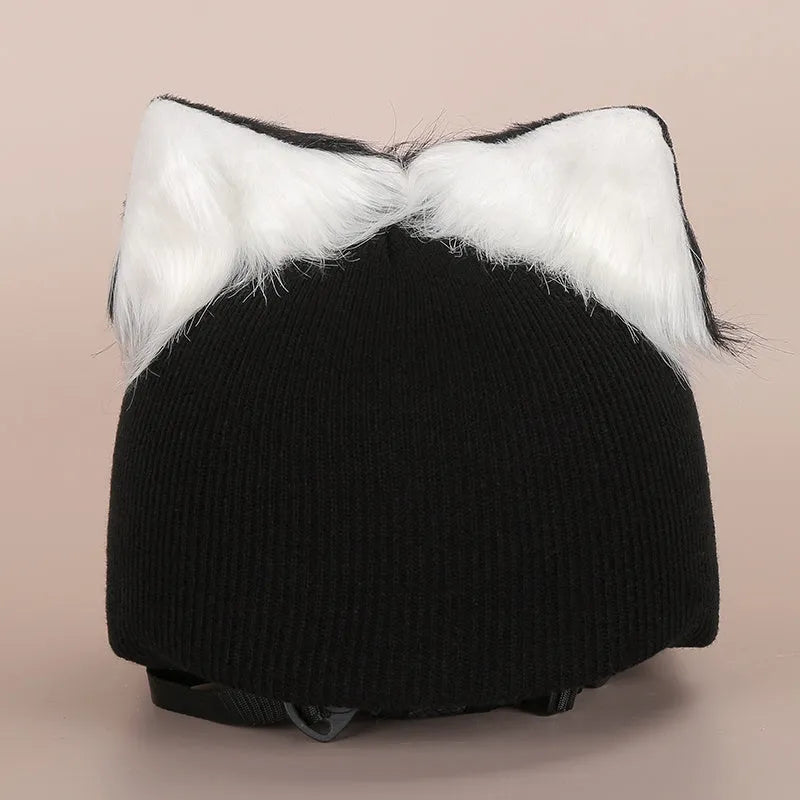 A plush fabric helmet cover with cartoon character ears, shown in size M for bicycle or motorbike use.