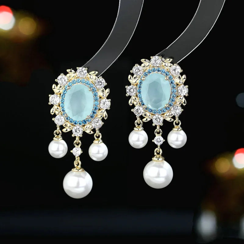 Geometric oval pearl tassel earrings with zircon detailing in light purple colour