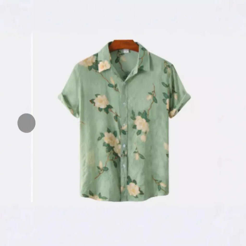Man wearing a short sleeve Hawaiian floral print shirt with a lapel neckline, showcasing the digital print pattern.