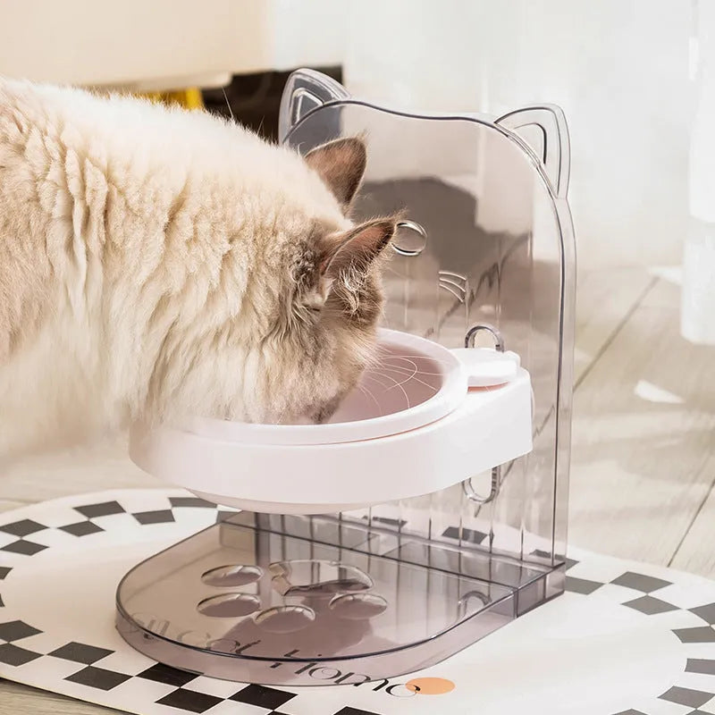 Grey pet bowl with cat ear sides, shown with adjustable height stand and removable cage attachment.