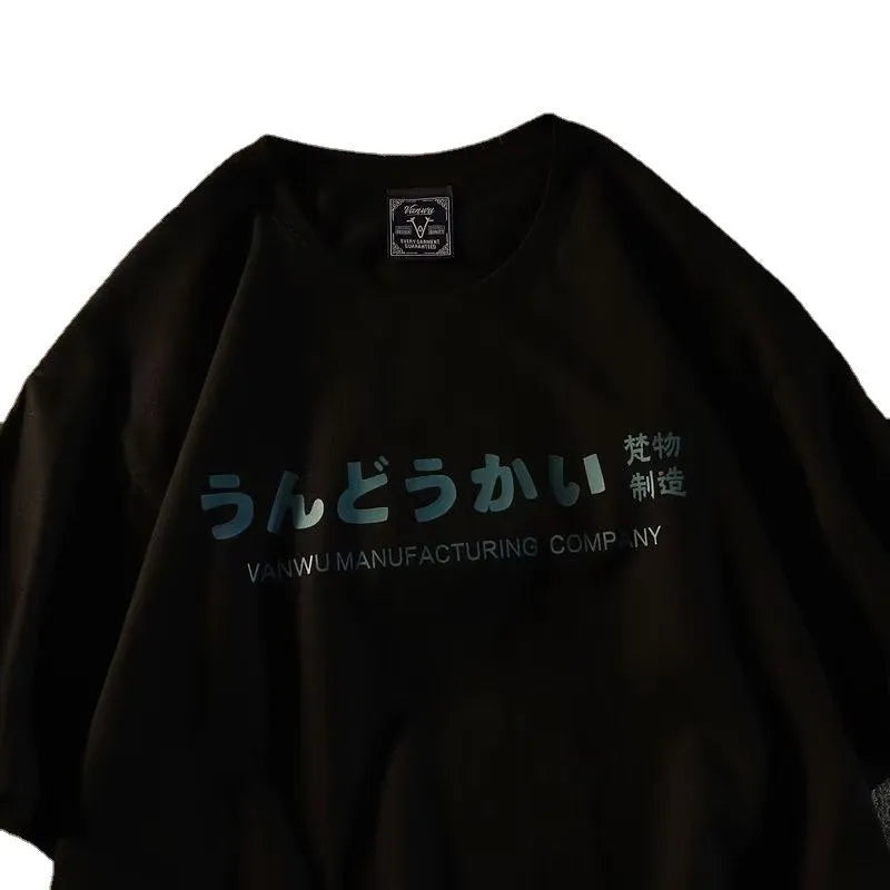 Cotton loose fit short sleeve t-shirt with letters print in black, shown on a model.