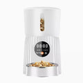 Black and white intelligent pet feeder with automatic timing and remote control functions