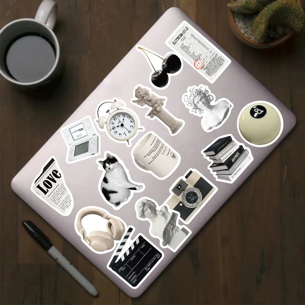 61 black and white PVC waterproof stickers for laptops, phones, and luggage