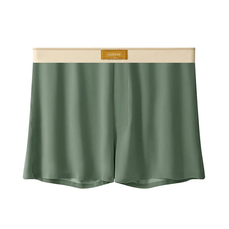 Pack of three men's solid colour loose fit ice silk underwear briefs on a grey background.