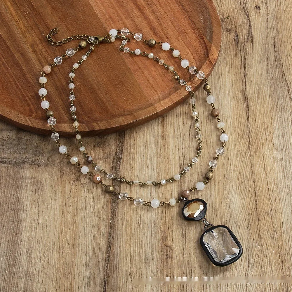 Two-layer tribal necklace with stone and glass pendants on adjustable chain
