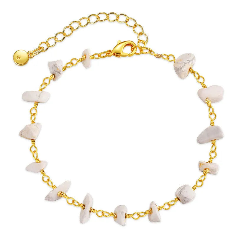 Geometric women's bracelet with irregular natural gravel turquoise stones and crystal accents on 18K copper