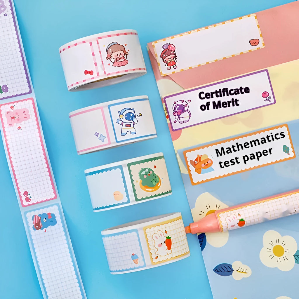 Roll of cartoon adhesive name tape stickers showing Dinosaur, Astronaut, Rabbit, and Girl designs.