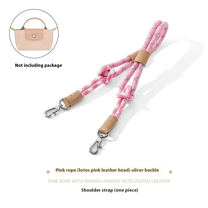 Braided nylon and cowhide leather crossbody shoulder strap with gold alloy buckle on a grey background.
