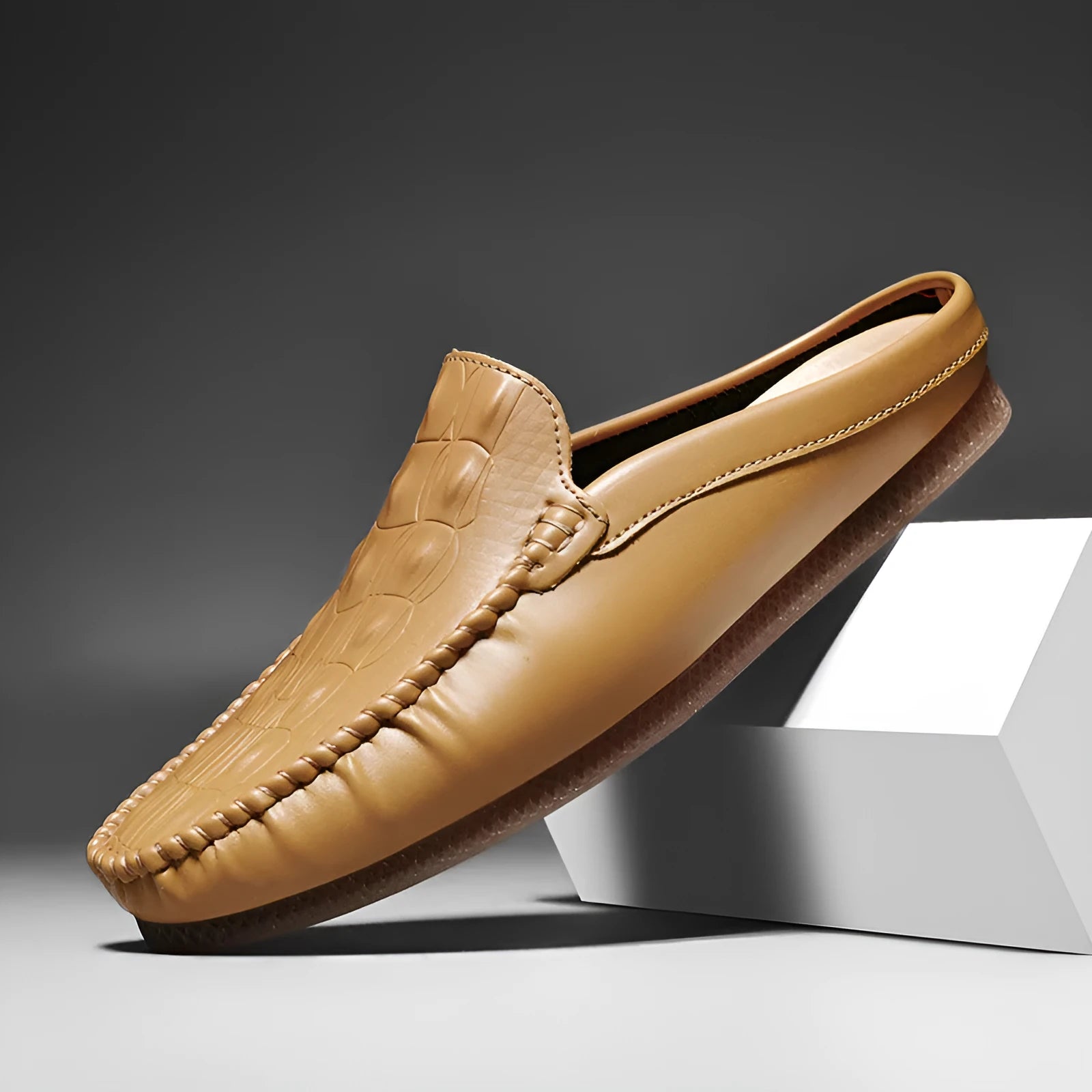 Men's black breathable Gommino semi-slippers with artificial PU upper and rubber sole.