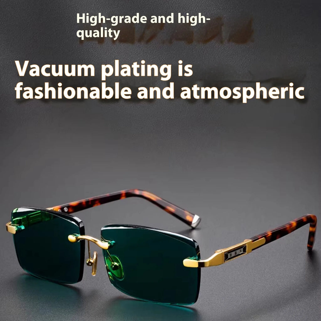 Dark green frameless crystal sunglasses with a glasses case and cleaning cloth.