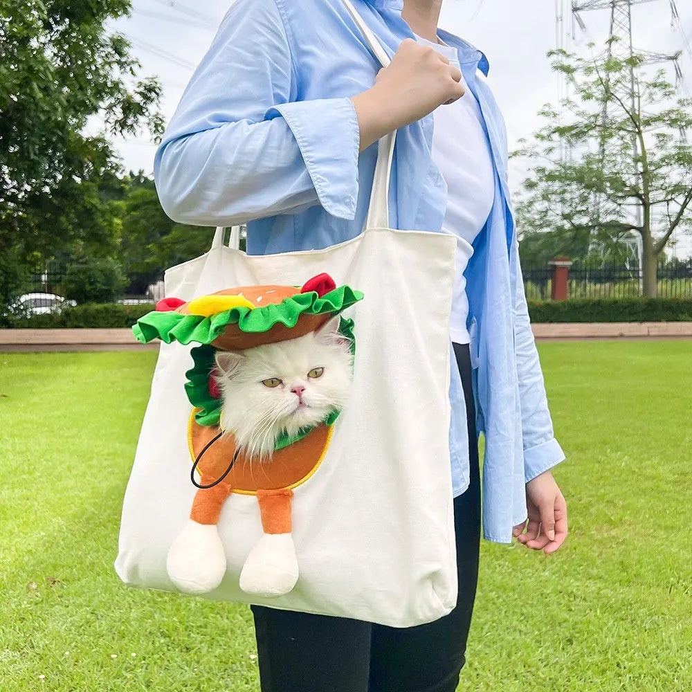 Soft canvas pet shoulder bag with cartoon pattern, shown in Light Denim colour for carrying small dogs or cats.