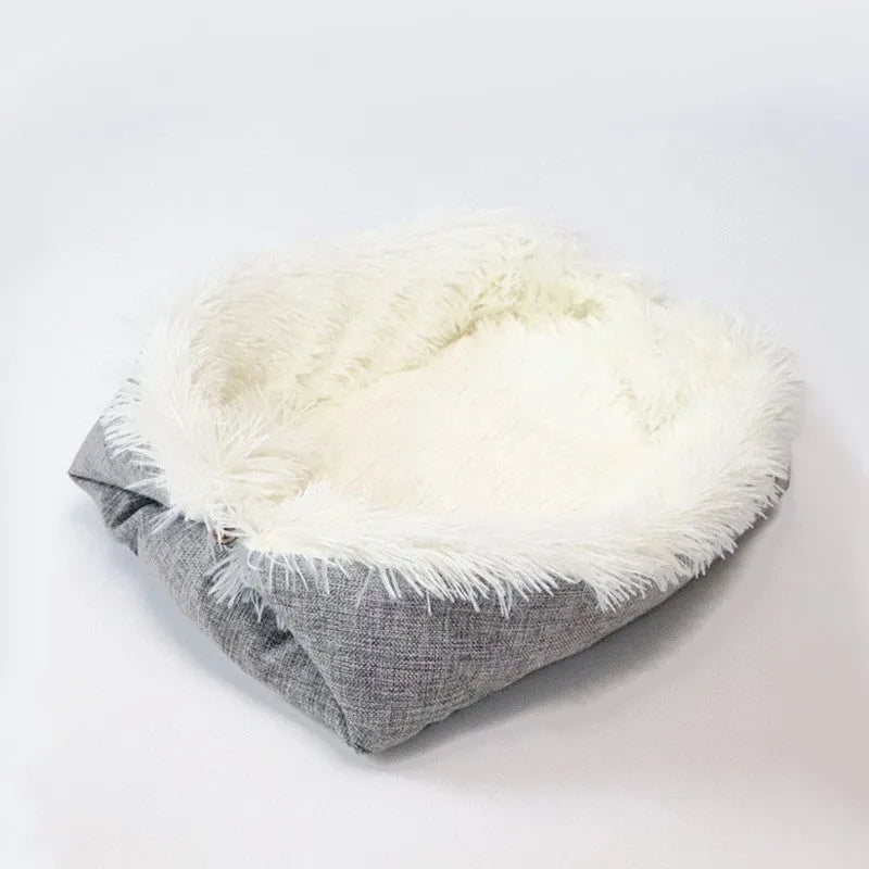Grey and white long plush pet bed with black non-slip bottom particles