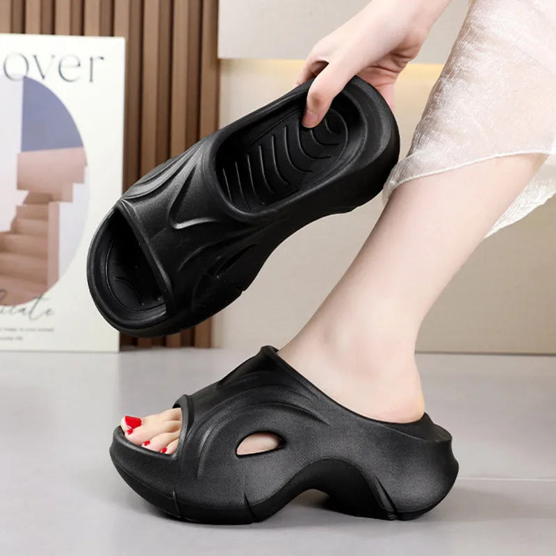 Women's thick-soled beach slippers in white, black, and rose red colours with EVA construction