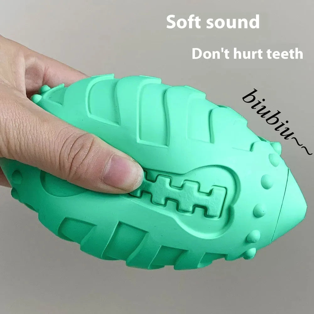 Thickened rubber rugby ball dog toy in light green or sapphire blue for interactive play and teeth cleaning