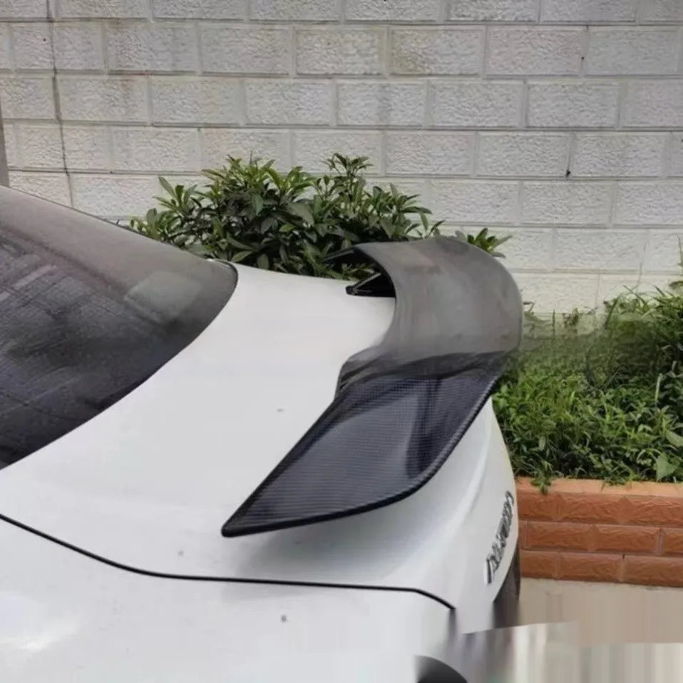 Universal car punch-free tail wing spoiler in ABS plastic with four finish options