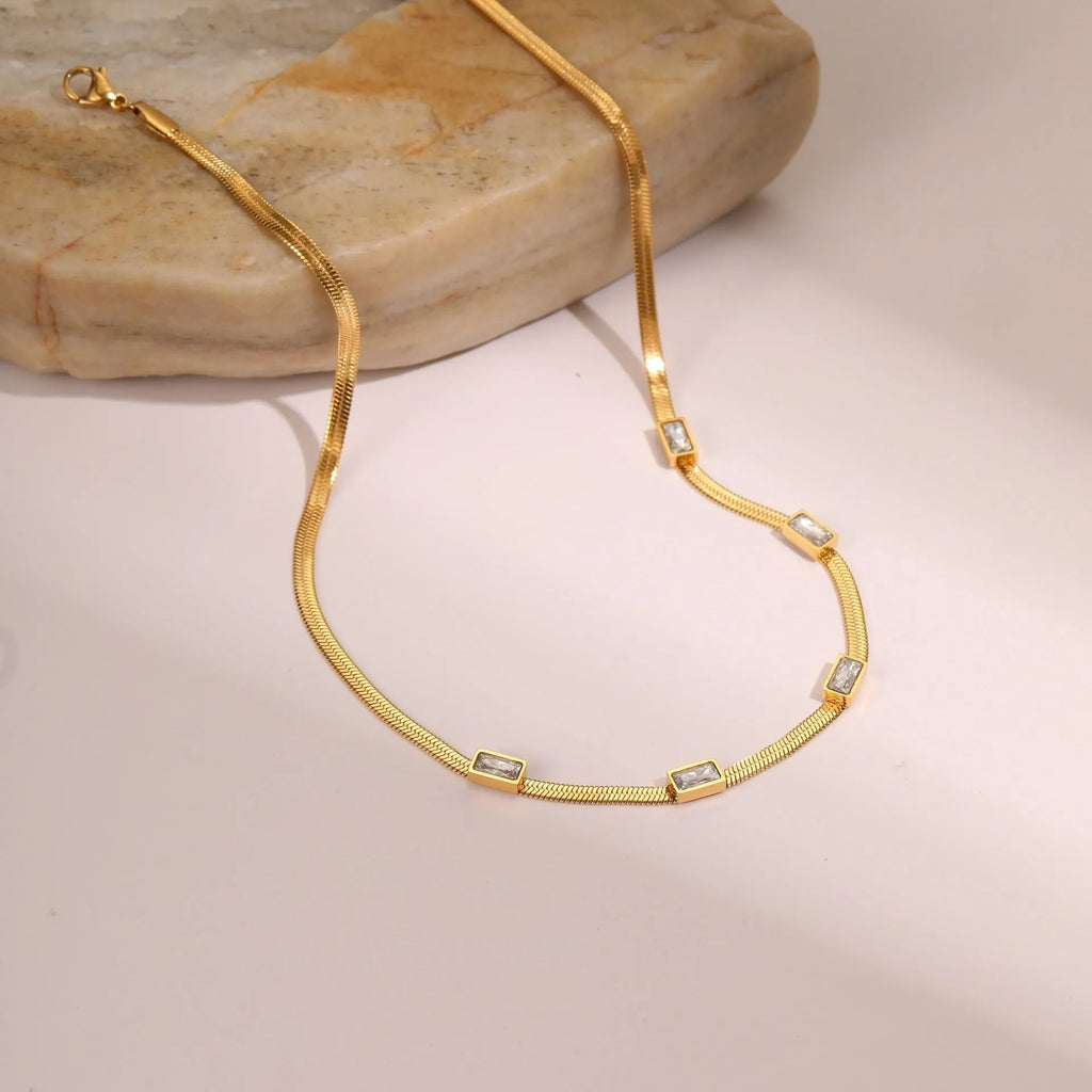Geometric square zircon necklace on flat snake chain with gold or steel colour electroplated finish
