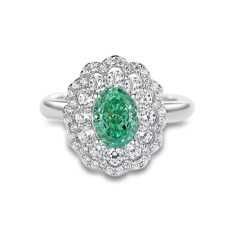 S925 silver emerald ring for women with inlaid high carbon diamonds in a geometric design on a white background.