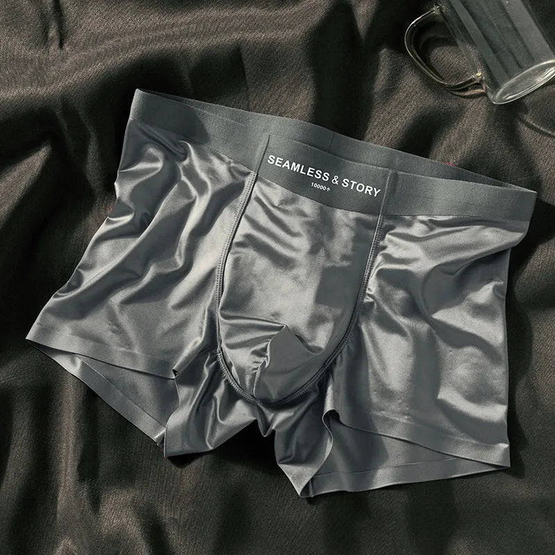 Men's ice silk underwear set in a solid colour showing mid-waist traceless design.