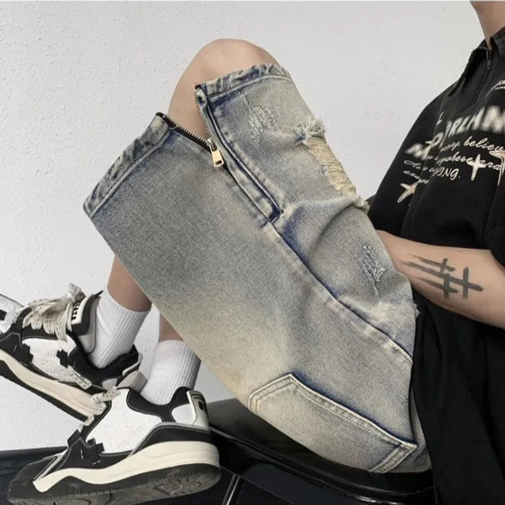Blue wide-leg denim shorts with tattered retro styling and loose fit design