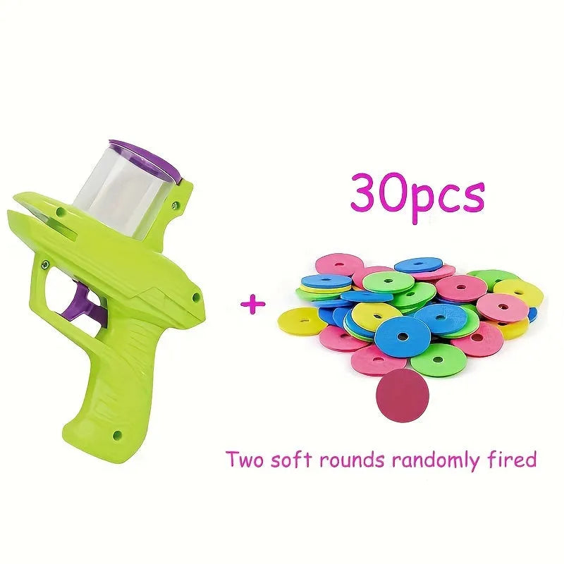 Green interactive cat toy launcher with foam disc for indoor pet play
