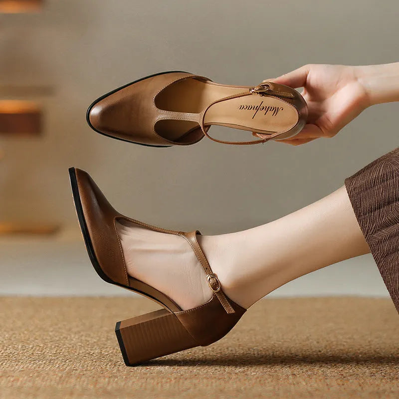 Women's dark brown retro pointed-toe Mary Jane shoes with a buckle fastening on a leather upper.