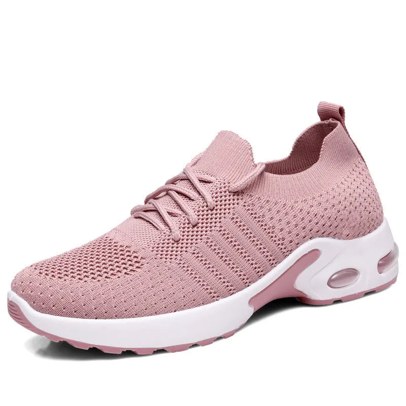 Women's black mesh casual sneakers with lace-up front and a light grey PVC sole.